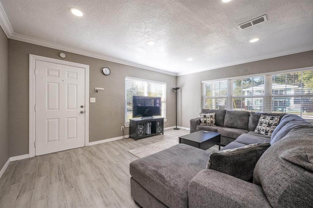 FRONT DOOR VIEW OF LIVING ROOM