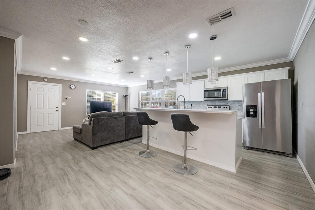 LIVING ROOM AND KITCHEN VIEW