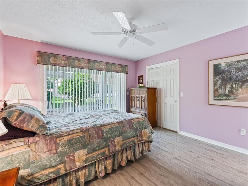 Primary Bedroom with Sliding Glass Doors out to the Lanai