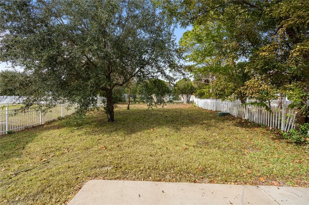 Spacious backyard that can be fenced in making it the ideal private play area for your children and pets.