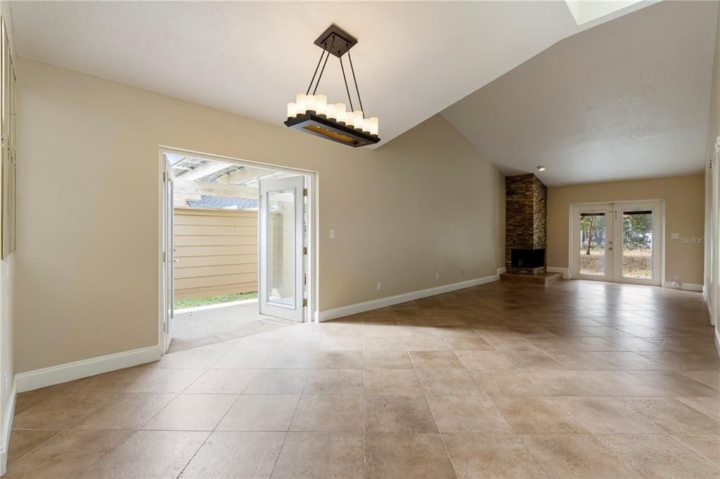 French doors leading from the dining room to the side patio making this the ideal location for a cookout or to entertain.