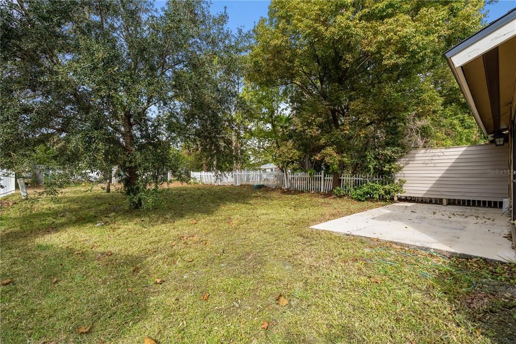 Spacious backyard that can be fenced in making it the ideal private play area for your children and pets.