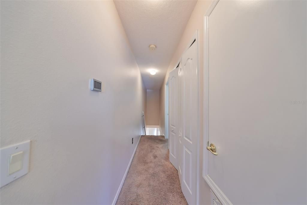 Hallway between bedrooms