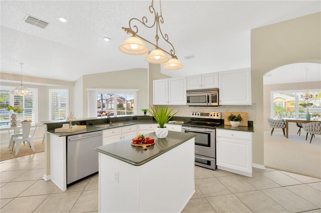 Kitchen with Views of Breakfast Nook, Pool and Formal Dining