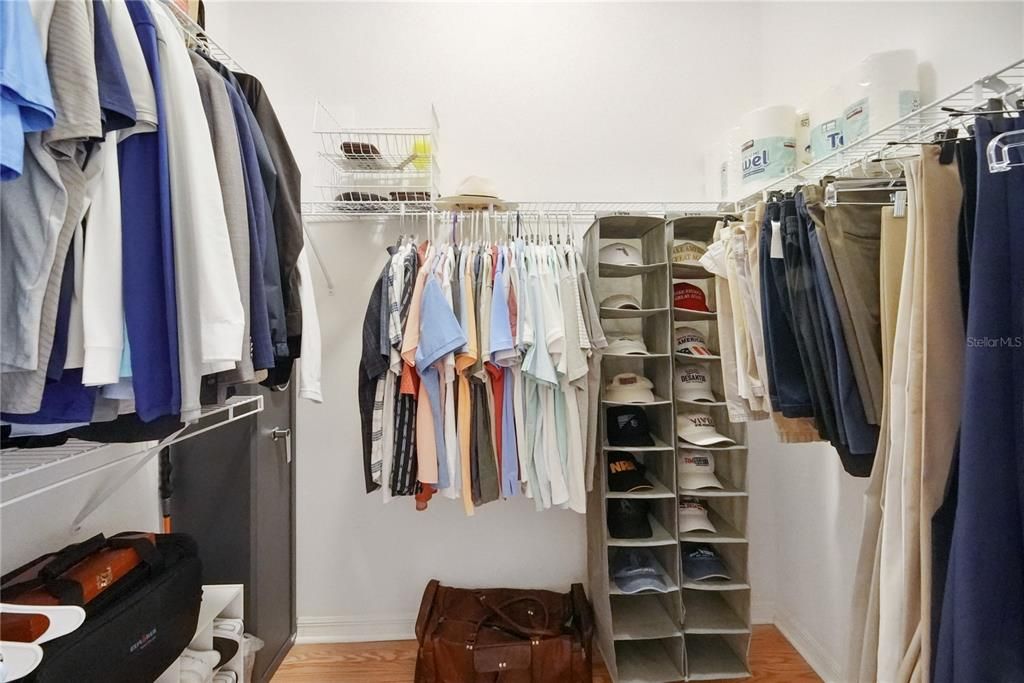 Primary bedroom walk-in closet