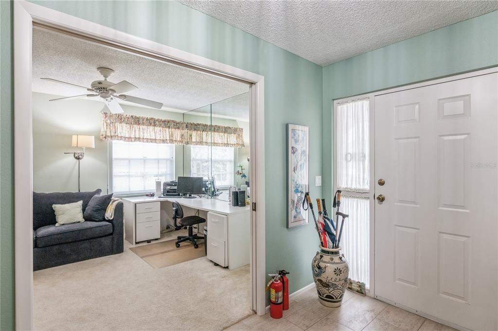 Entrance and doors to third bedroom/ office.