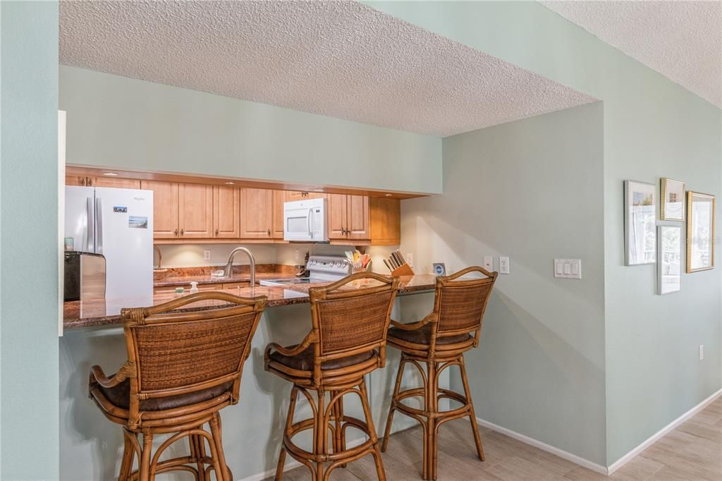 Extended counter with bar stools.