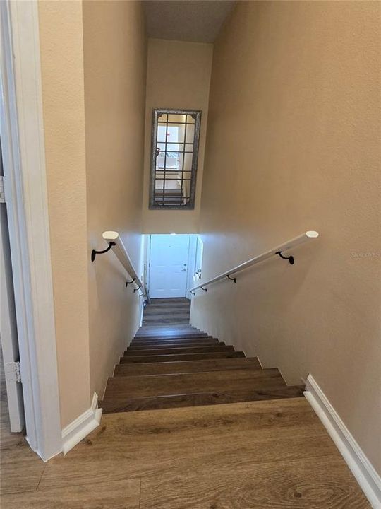 Stairway to garage and Entry Door