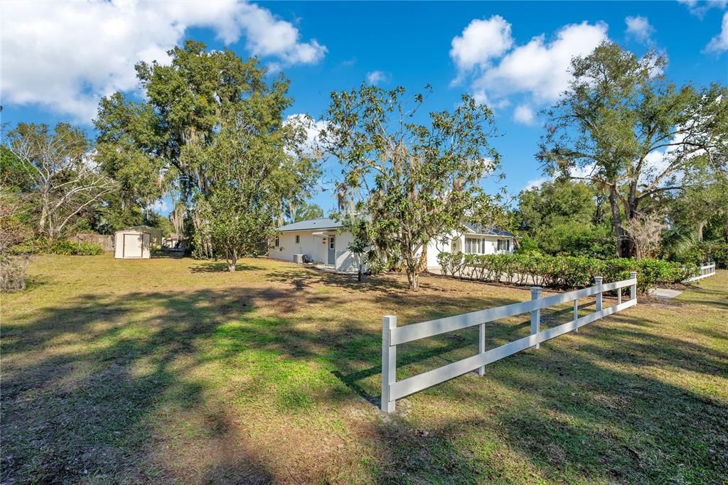 Oversized lot includes the 2 sheds to the left of the property.