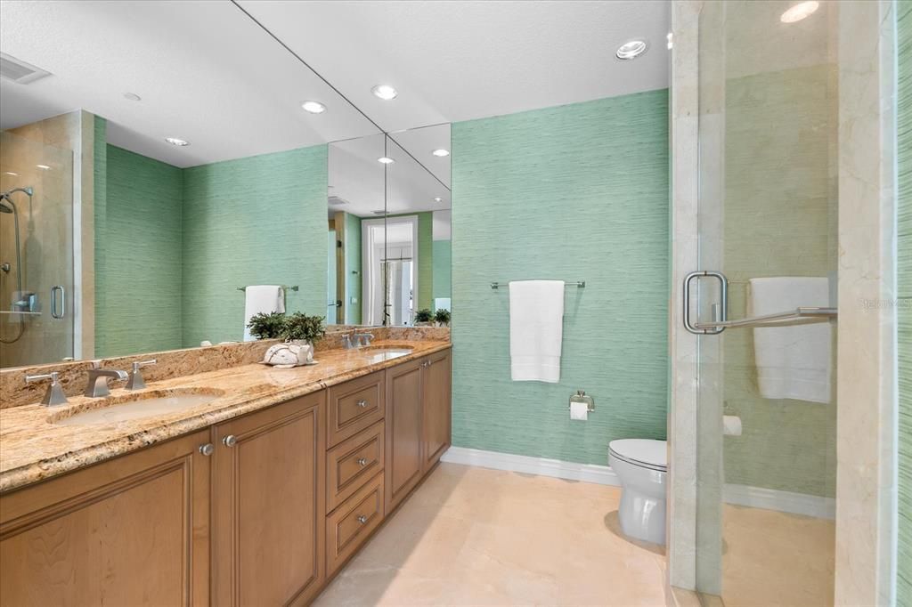 2nd Bedroom Suite bathroom with Walk-in Shower and Dual Vanities