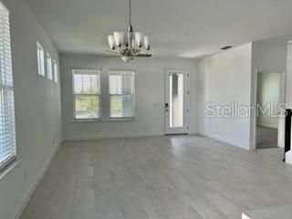 Family Room with Primary Bedroom Doorway on the Right.