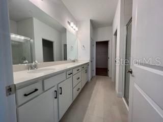 Primary Ensuite Bathroom, Large Glass Enclosed Shower, Large Walk-In Closet.