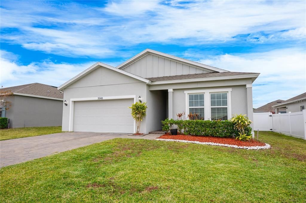 Built in 2021 this spacious 4-bedroom, 2-bath home FEELS LIKE NEW and delivers an immaculate interior with TILE FLOORS THROUGHOUT, an UPGRADED KITCHEN, privacy FENCED YARD, all with a LOW HOA and in a great Deltona location!