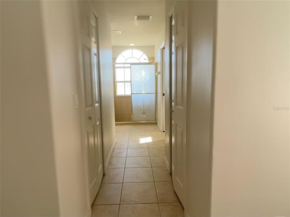 Two closets one on each side heading into primary bath