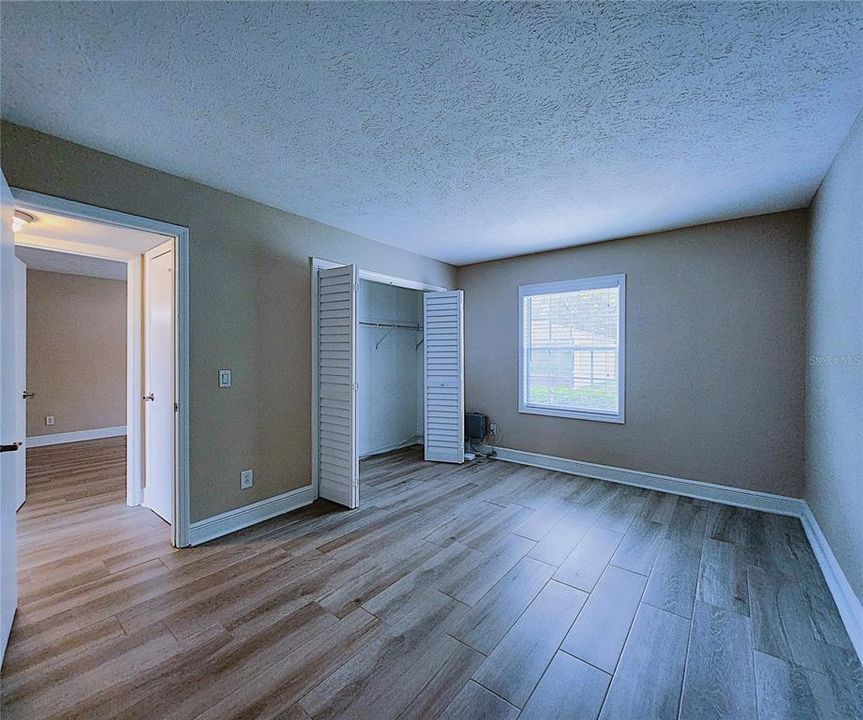 Guest Bedroom includes 2 closets: a walk-in & a built-in.