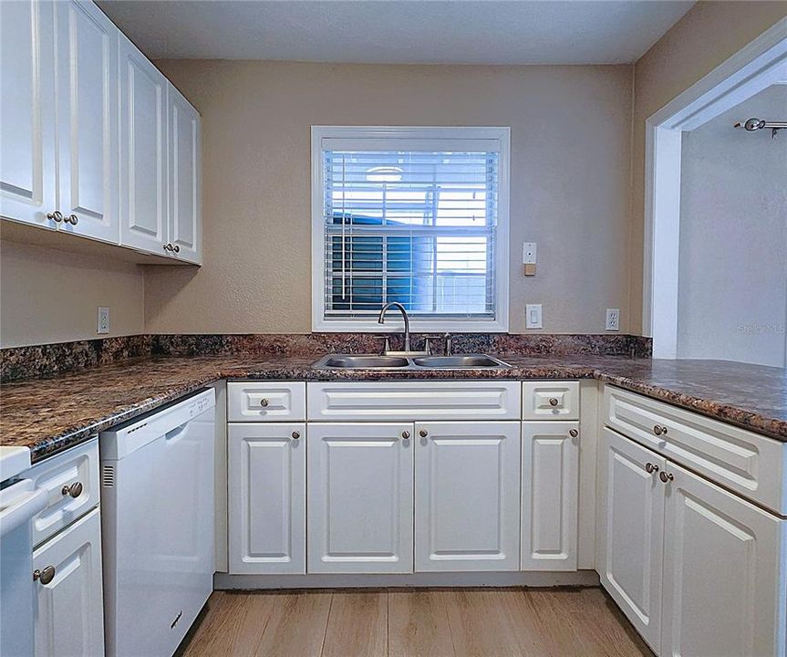 Renovated Kitchen includes all refrigerator, dishwasher, stove, countertop microwave, garbage disposal