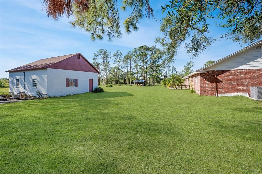 DETACHED GARAGE SHOWING PAD FOR RV