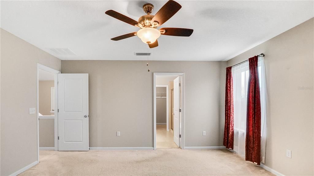 Primary Bedroom with View of Master Bath