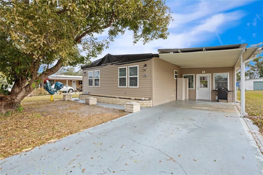 Betmar 55+ plus golf community. This home has hurricane damage to roof & carport.