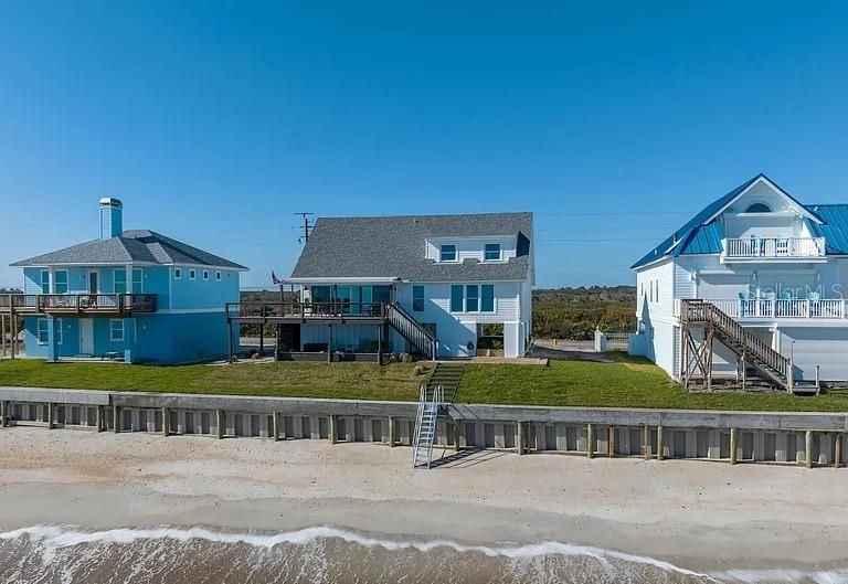 Seawall and private stairs to the beach