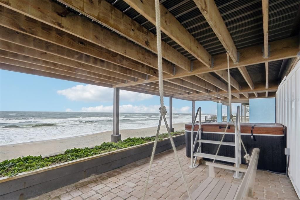 Outdoor swing next to the hot tub