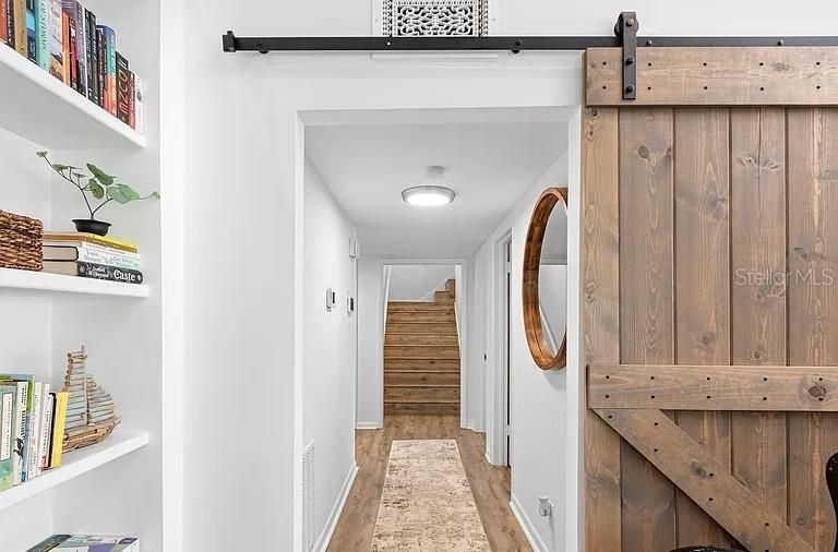 Barn door to close off living area from the bedrooms
