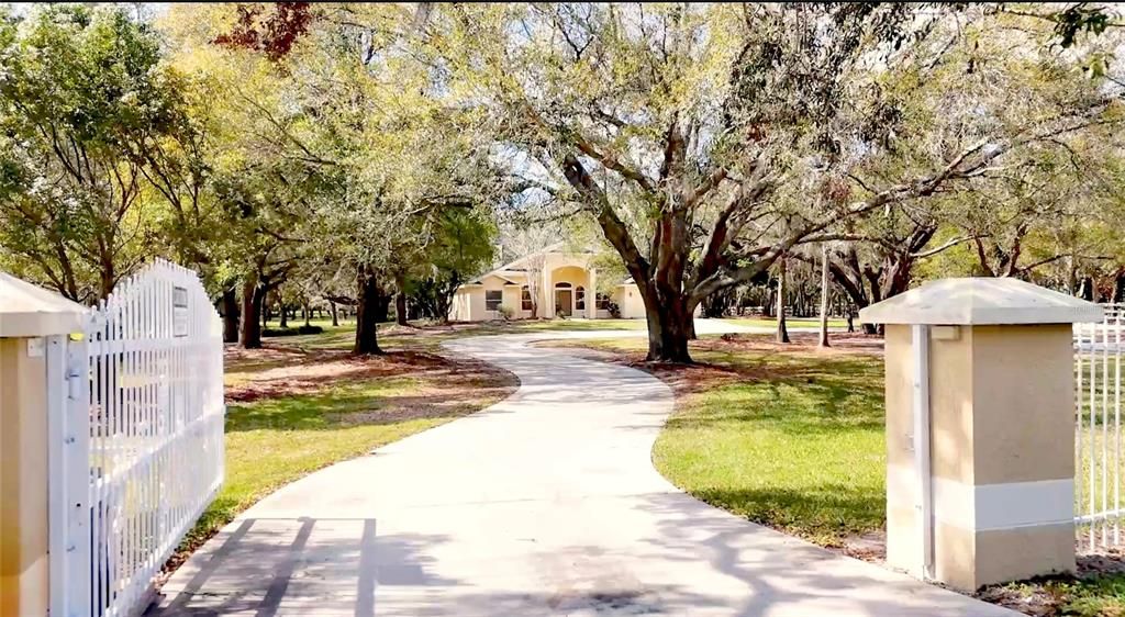 Gated Property on 5.9 Acres with an Oasis Pool & Spa and a 2,400 square foot barn. No HOA!