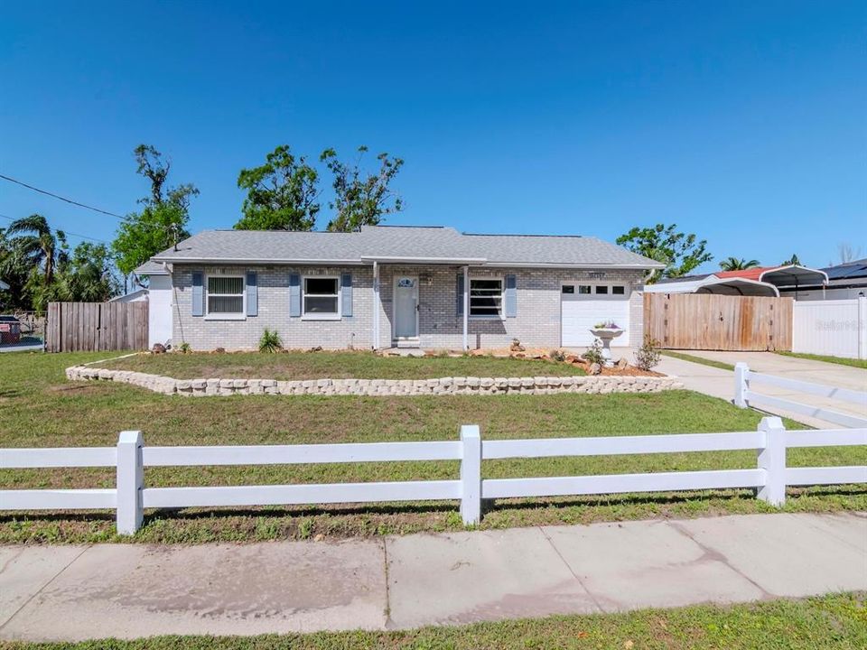 This great home sits on an oversized lot offering space, privacy, and endless potential!