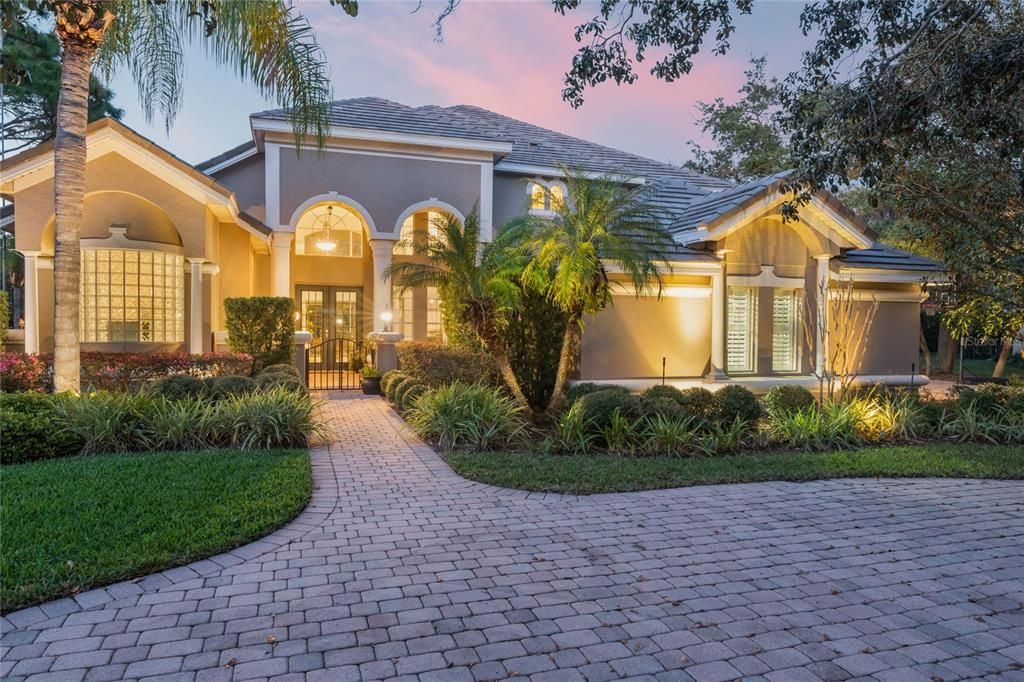 Twilight view of luxurious home in Reserve at Belmere