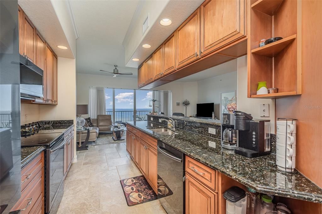 Kitchen opens to Living Area