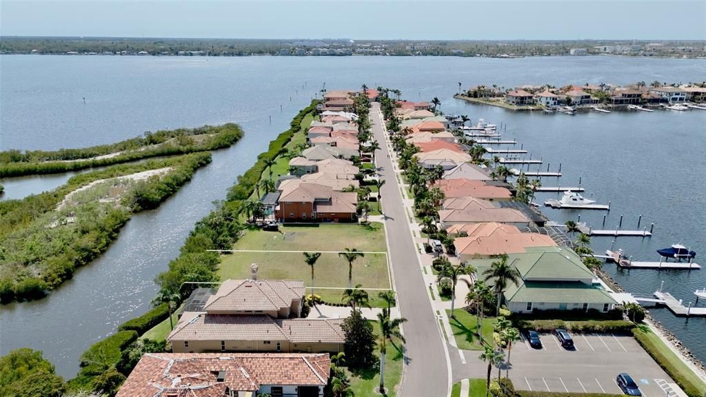 Lot #3 in Peninsula at Riviera Dunes, a waterfront community with deep-water marina on the Manatee River. Lines in the photos are approximate and are not meant to show dimensions just location of lot.