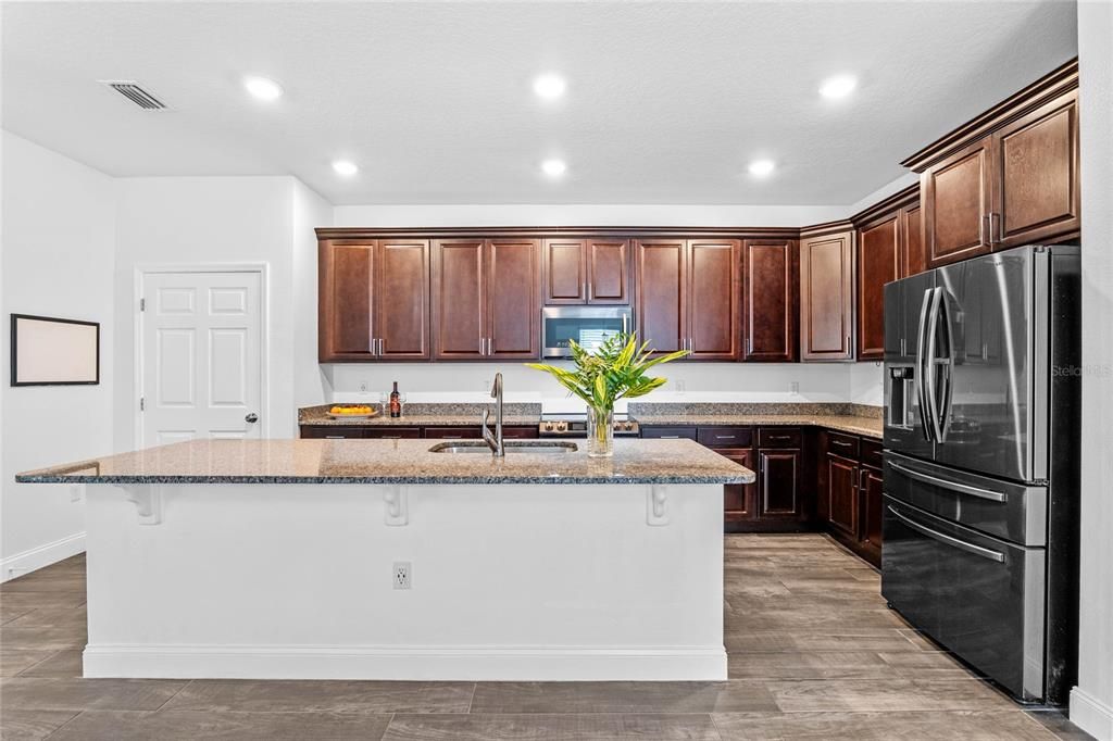 Large kitchen with plenty of cabinet storage.