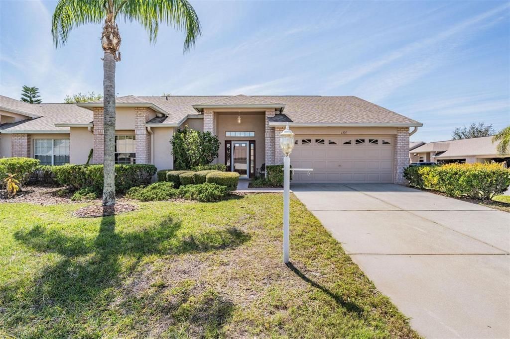 This beauty with a covered entry is waiting for your touch!