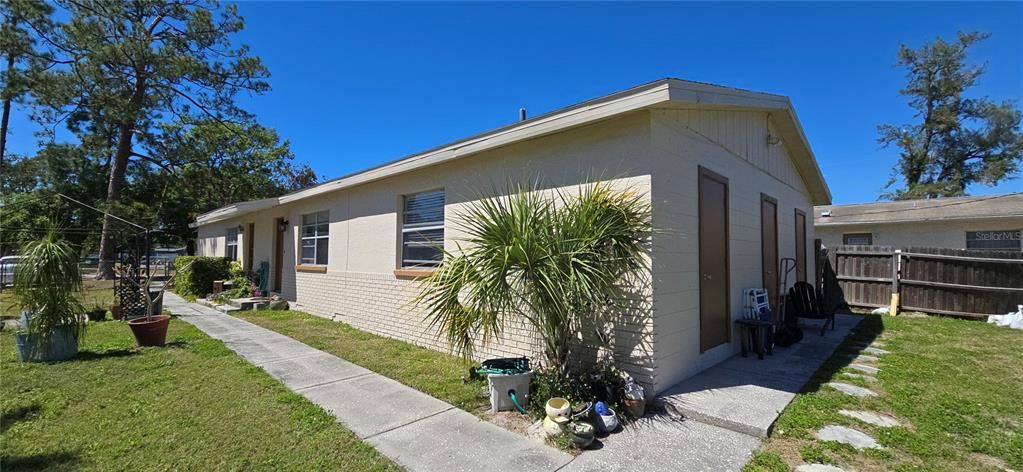 Storage units and laundry located on the east end of building's