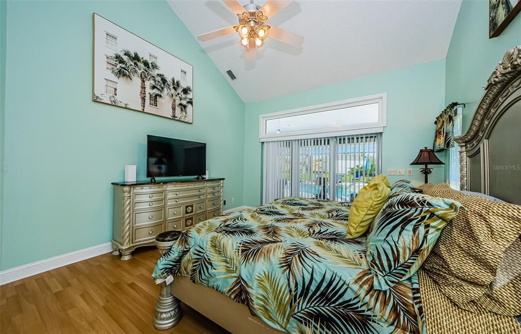 Primary bedroom with access to pool.  Split bedroom home.
