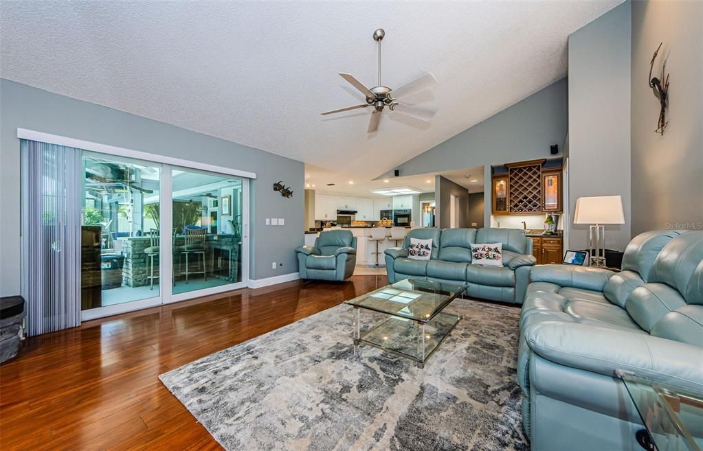 Family room, view back to kitchen and wet bar.