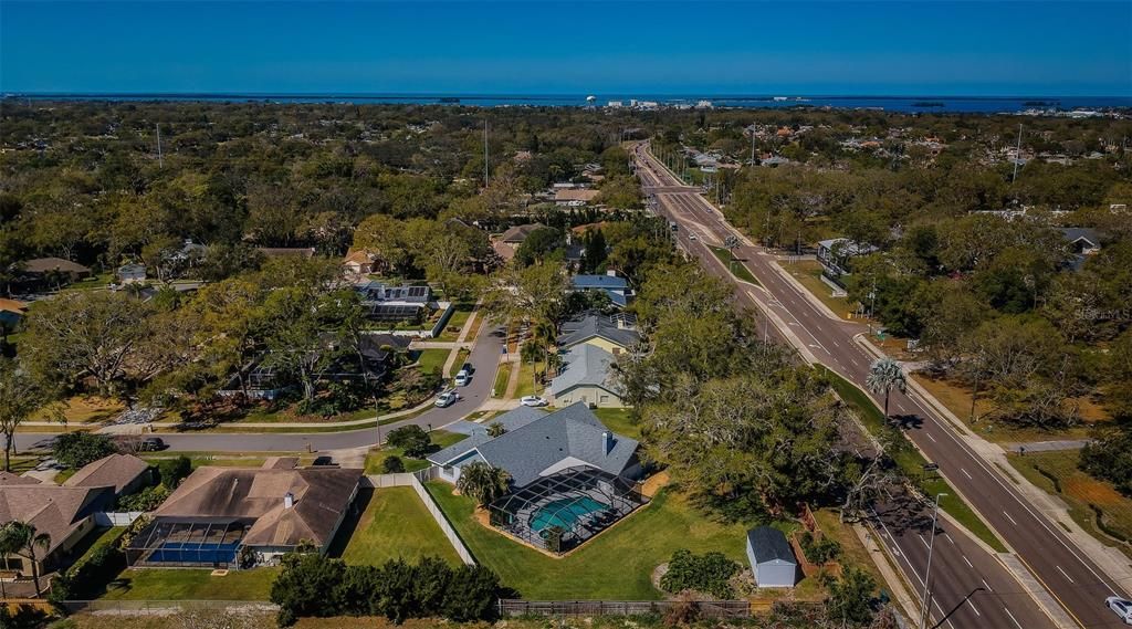 A rear view of this .55 acre lot completely fenced, and centrally located to the beached, shopping, groceries, doctors, schools etc.