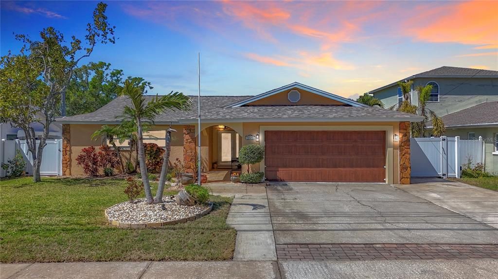 OH LA LA! Welcome to your DREAM HOME! This immaculate BLOCK construction 3-bedroom, 2-bathroom, 2 car garage single-family residence with open floor plan and POOL offers a perfect blend of modern comfort and timeless elegance. This home also features a BONUS ROOM/FLEX SPACE!