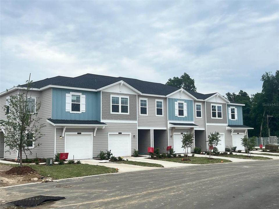 Rendering.  Illustration only, not actual townhome. Colors, features, and number of units will vary.