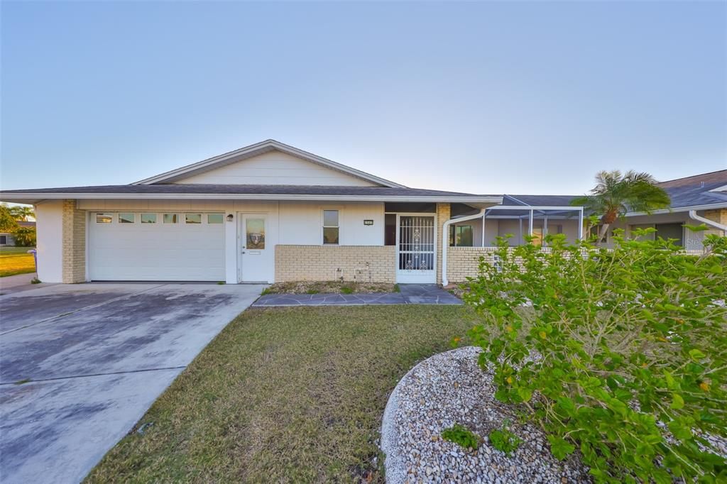 As you enter this home you have a deep front driveway fit for plenty of guests.