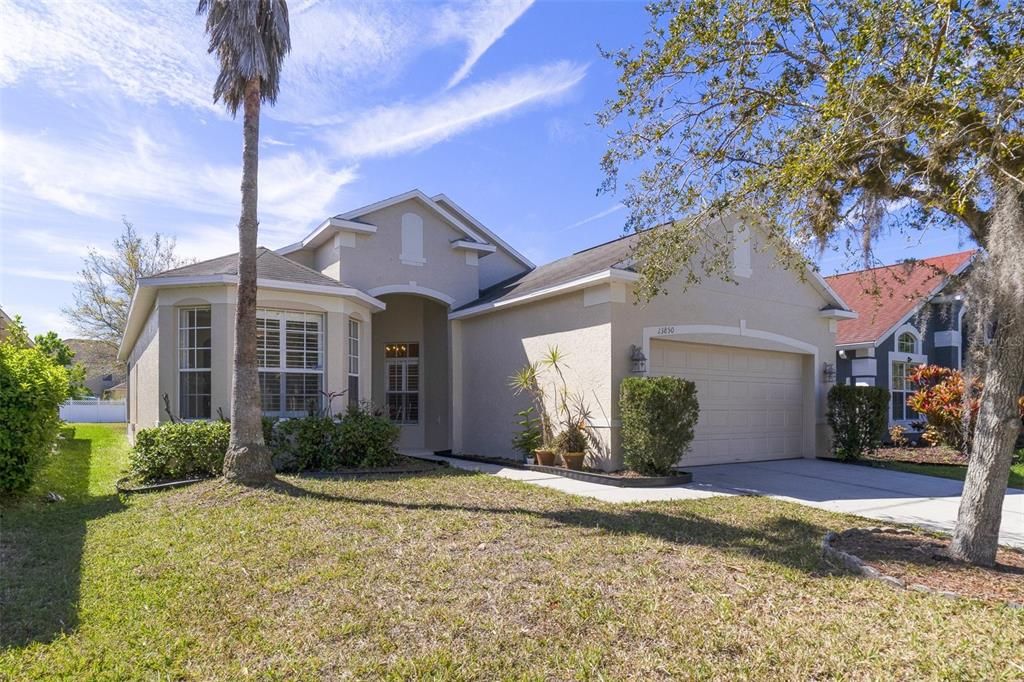 Live a lifestyle of comfort, convenience and community in sought-after AVALON LAKES in East Orlando!