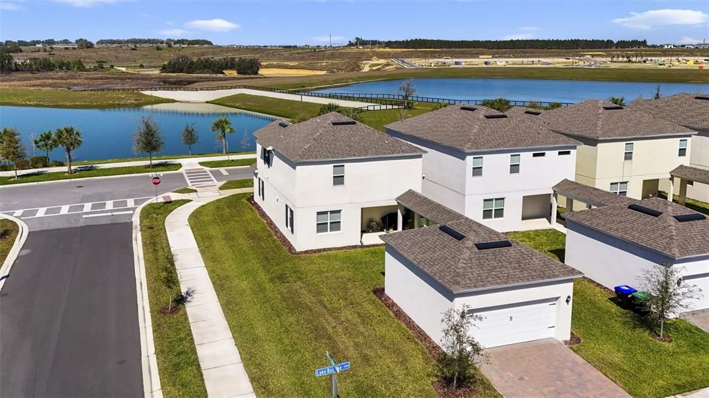 Beautiful water views. Covered back porch and walkway to two-car garage. Paver driveway!