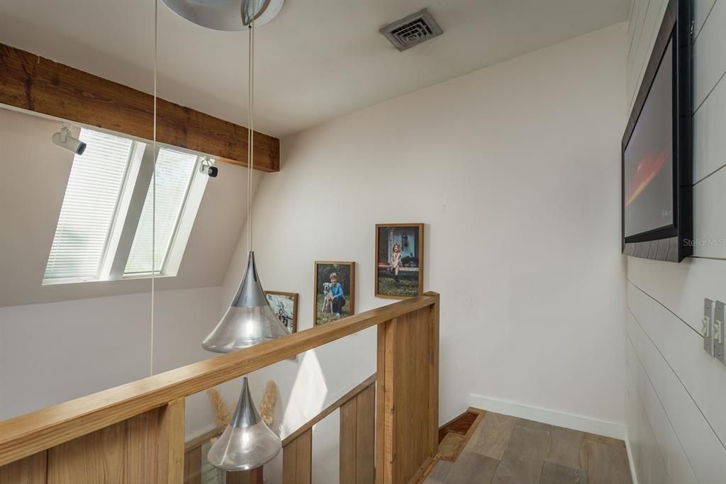 Stairs from loft to front foyer