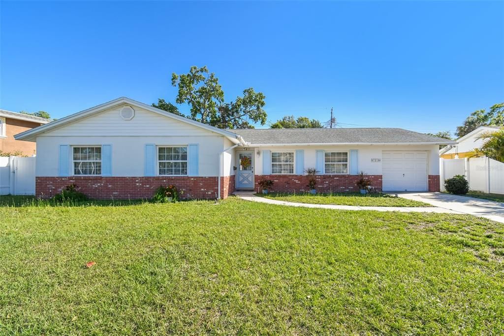 7910 Jackson Springs Rd is a charming 4 bedroom/2 bath home with a gorgeous screened-in pool!