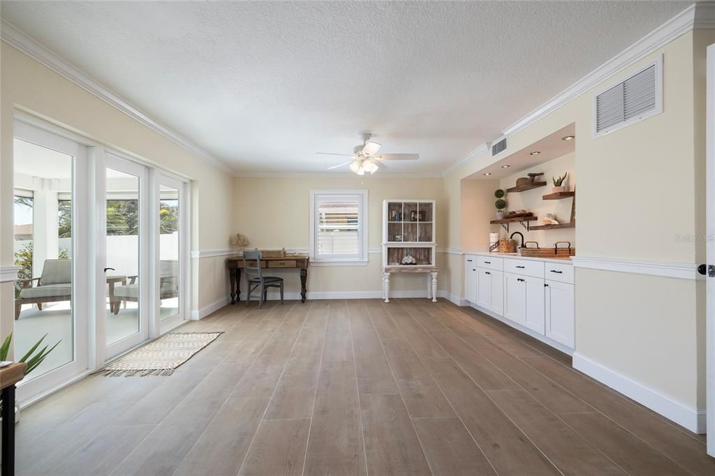 Lower-level Living Area with wet bar and pool access