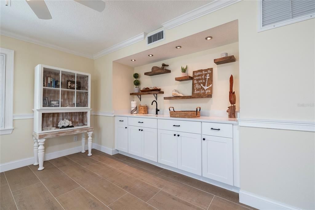 Lower-level Living Area with wet bar and pool access