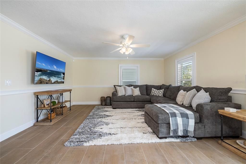 Lower-level Living Area with wet bar and pool access