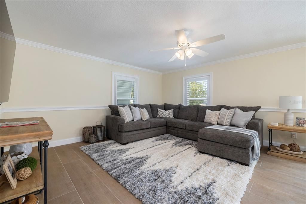 Lower-level Living Area with wet bar and pool access