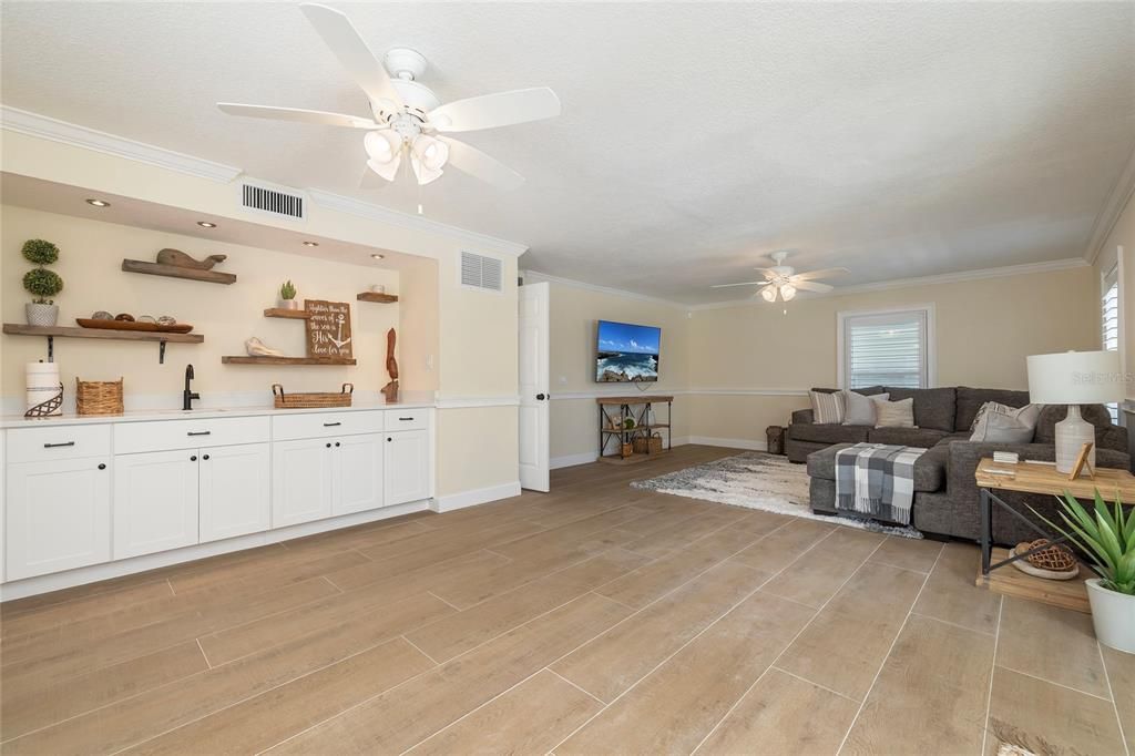 Lower-level Living Area with wet bar and pool access