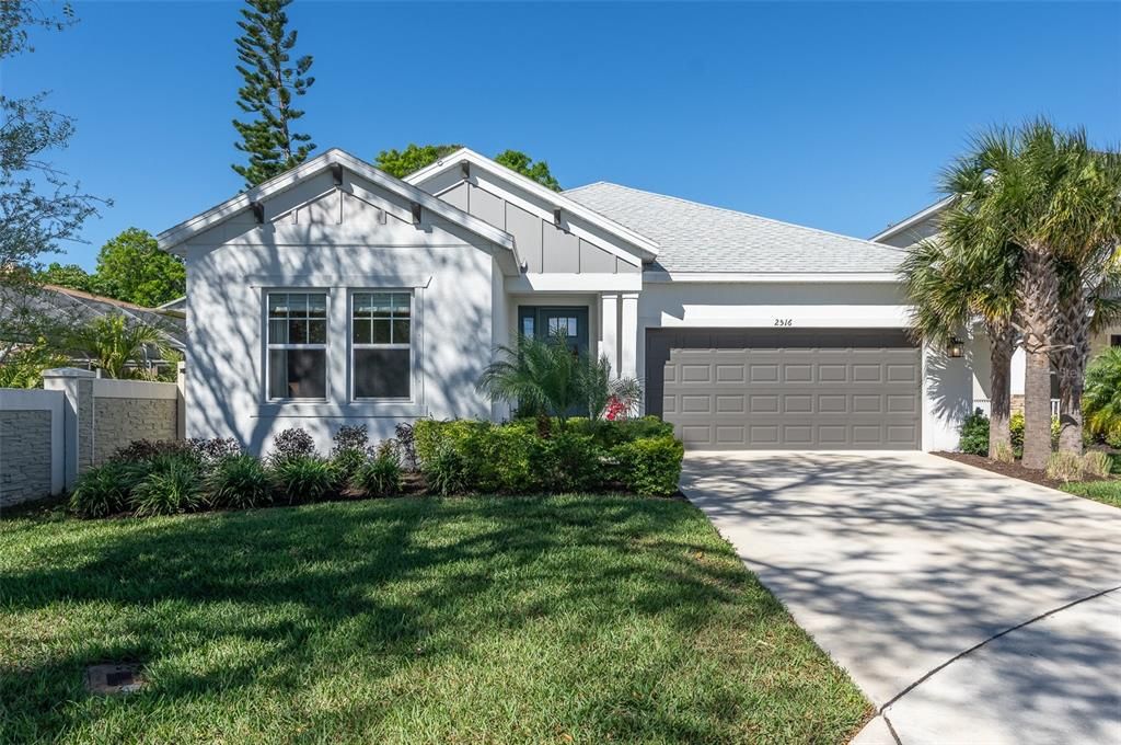 Welcome Home to 2516 Leafwing Court! Located gated enclave in Palm Harbor, 2023 Built